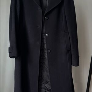 Woman’s navy overcoat
